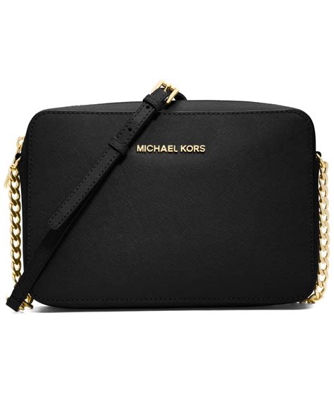 michael kors jet set travel pouch black|Michael Kors jet set airplane.